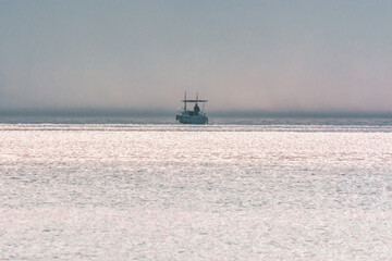 Pêcheur un jour de brume sur le léman