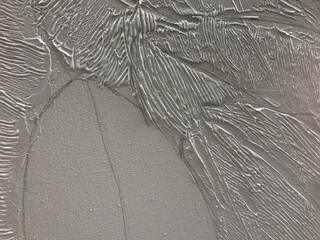 White, beautiful gray surface, convex from acrylic paint, volumetric with stripes and patterns. The background. Texture