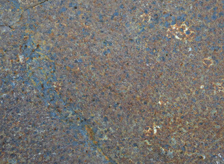 The texture of the old rusty metal. Rust spots and streaks on the surface of light metal. 
