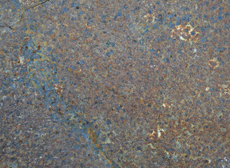 The texture of the old rusty metal. Rust spots and streaks on the surface of light metal. 