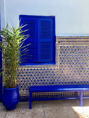 Blue window and wall inside the Slat Al Azama synagogue in Marrakech, Morocco