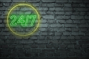 Old type neon sign on a brick wall.