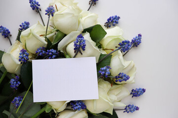 greeting card mockup. large bouquet of white roses and space for text 