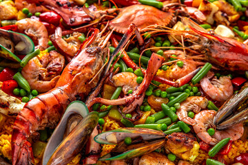 Paella. Spanish dish of rice and seafood, vegetables and chicken. Shrimp, octopus, crab and mussels. Banquet festive dishes. Gourmet restaurant menu. White background. Pattern