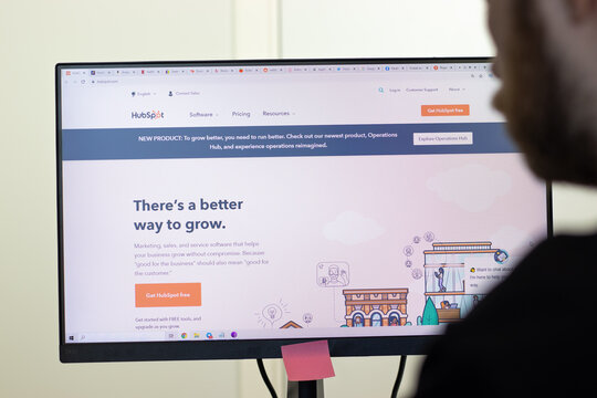 New York, USA - 26 April 2021: HubSpot website page on screen, man using service, Illustrative Editorial.