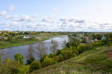 Fototapeta na wymiar View of the Volga river, the town and road bridge, Staritsa, Tver region, Russian Federation, September 20, 2020