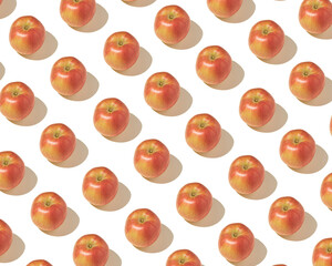 Pattern arranged from fresh, organic, red apples on a white background