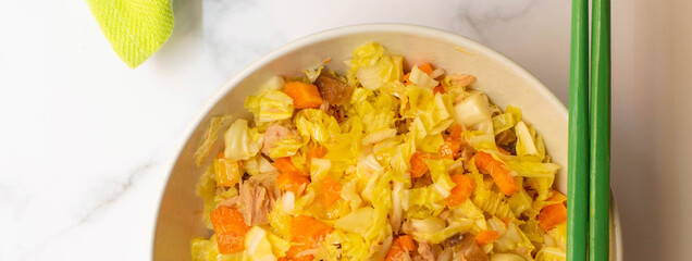 Banner of Chinese cabbage salad with carrots and tuna