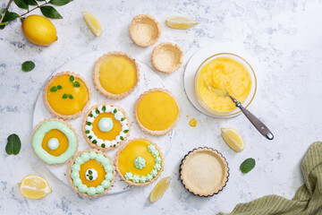 Traditional french lemon tart on wooden board