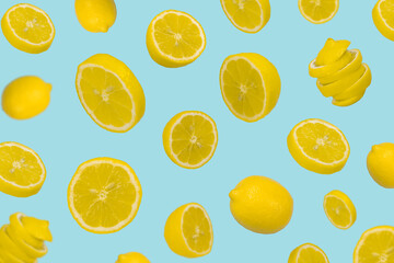 Floating levitating fresh lemon on pastel blue background, Vitamins, healthy diet concept.