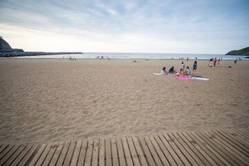 The wide beach of the resort town of Deba. Holidays in Spain. Expanse for surfers. Basque country Spain on July 22, 2020