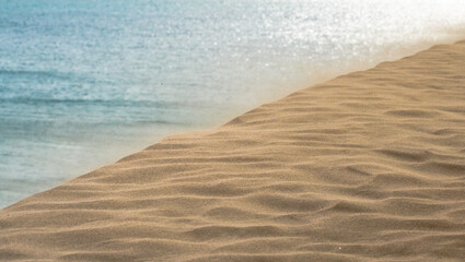 Fototapeta na wymiar Windy day on the sand dunes in Qatar.