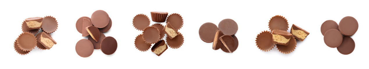 Set with delicious peanut butter cups on white background, top view. Banner design