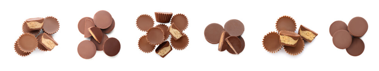 Set with delicious peanut butter cups on white background, top view. Banner design