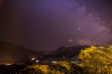 Milky way in Tena valley by night in summer from Formigal Huesca Aragon Spain