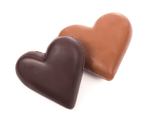 Chocolate hearts on white background. black and milk chocolate.
