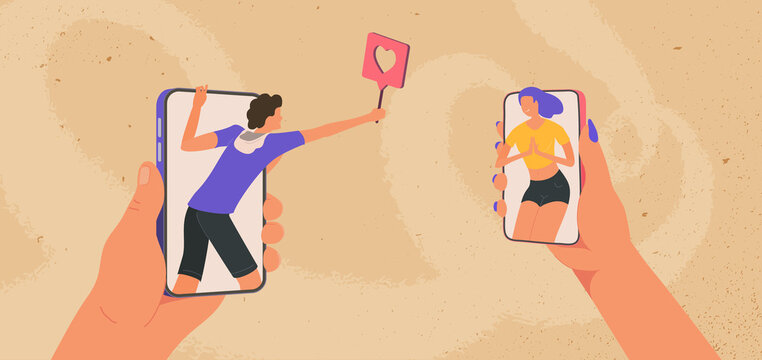 Young man and girl looking at each other on smartphones. Online meeting and flirting. Male giving a like female in social media. Boy telling he love girl by phone.