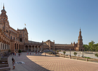 Fototapeta na wymiar People walking in the Plaza de España in Seville, Andalusia, Spain