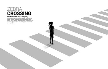 Silhouette of businesswoman standing on zebra crossing. Concept of safe zone and business road map. © Panithan