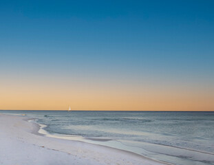 white sand on gulf beach at sunset
