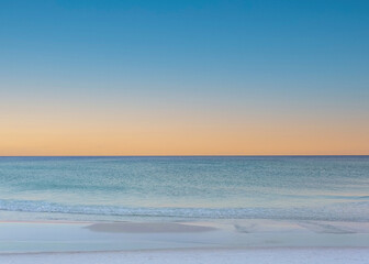 white sand on gulf beach at sunset