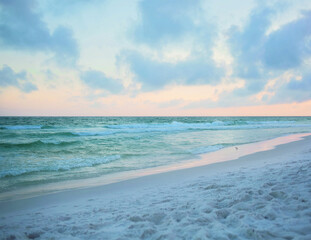white sand on gulf beach at sunset