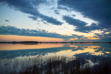 white sand on gulf beach at sunset