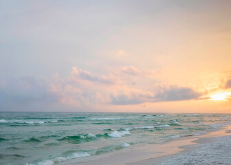 clouds above beach emerald coast gufl