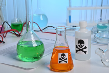 Toxic lab production of orange poison juice liquid. Toxicology lab test of orange juice. Orange...