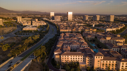 Sunset aerial view of the downtown skyline of Irvine, California, USA. - obrazy, fototapety, plakaty