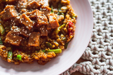 vegan Korean teriyaki sticky tofu with stir fry vegetables, healthy plant-based food