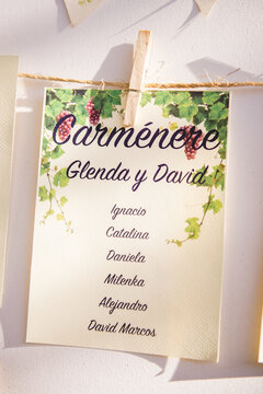Beautiful label with the order of one table in a wedding. The table have the name of a wine type, the carmenere