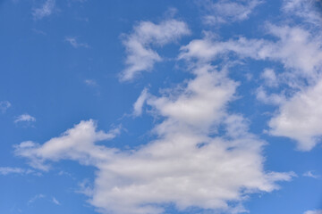 Beautiful white clouds on blue sky background.