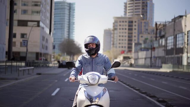 child riding a scooter