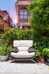 Fototapeta na wymiar house garden front with sofa
