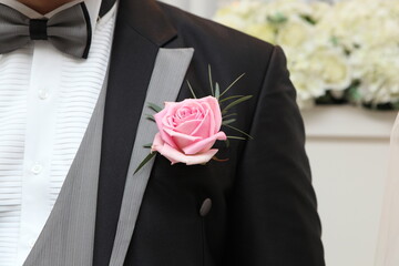 groom with rose