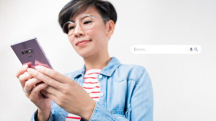 Search Engine Optimization - SEO concept. Close up of a woman's hand typing her smartphone...