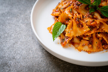 farfalle pasta with basil and garlic in tomato sauce