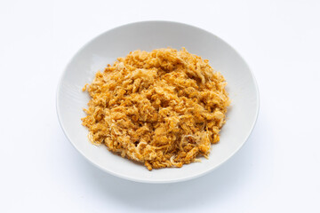 Dried shredded pork on white background.