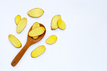 Ginger slices on a white background.