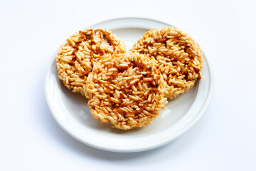 Rice cracker with coconut palm sugar on white