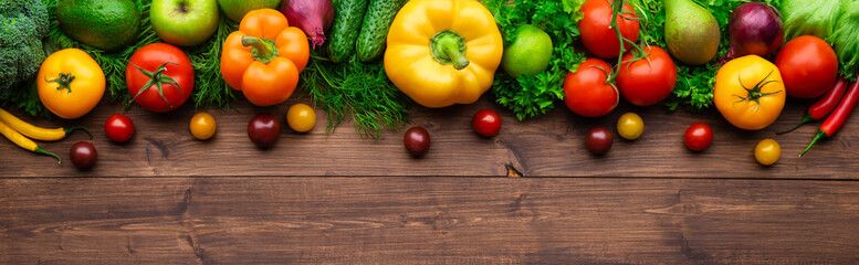 Selection of fresh products for preparing healthy and delicious vegetarian and vegan food. Various vegetables and fruits lie on the table. Flat lay.