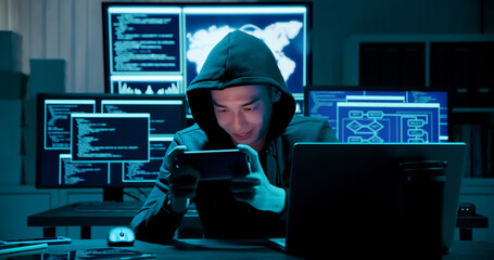 closeup of asian male hacker