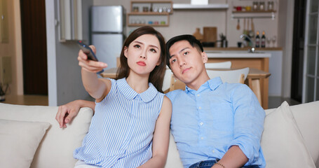 couple watch tv at home