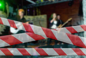 Concert hall with caution barrier tape due to coronavirus