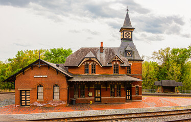 Fototapeta na wymiar Point of Rocks is a small town on the border of Virginia and Maryland, with historic buildings. Footage shows historic brick railway station build in 1873 as part of Baltimore Ohio railroad