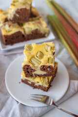 home made rhubarb cheesecake brownie on a table