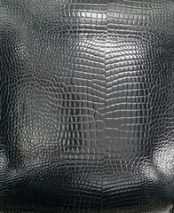Black leather upholstery texture with excellent detail for the background.