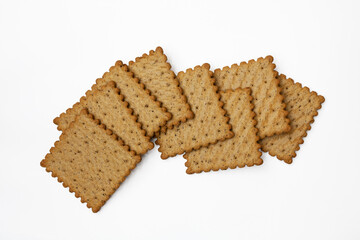 Some spicy wholegrain rye crackers. Isolated. Top view, flatlay.