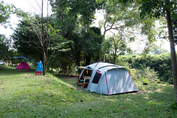 big gray tent with  glampingi at camping area near a stream in forest, holiday,Camping